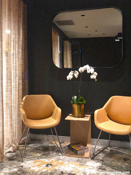 Gold and dark grey dentist office waiting area