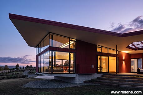 Farmhouse exterior at sunset
