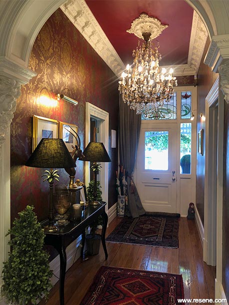 Glamorous villa entryway with a Resene Pohutukawa ceiling