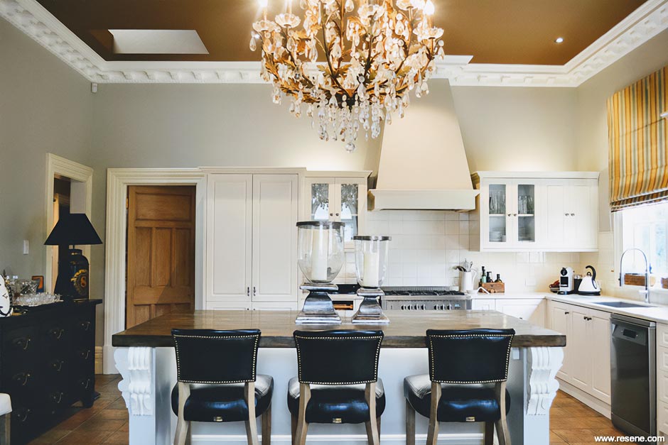 Glamorous villa kitchen with colourful ceiling