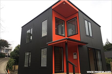 Bright orange and grey bach exterior