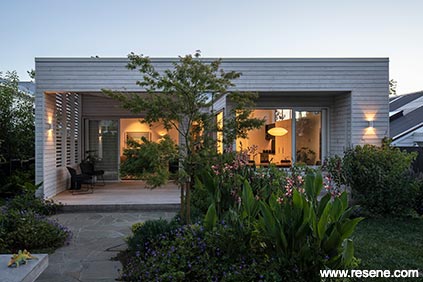 Modern home exterior at sunset