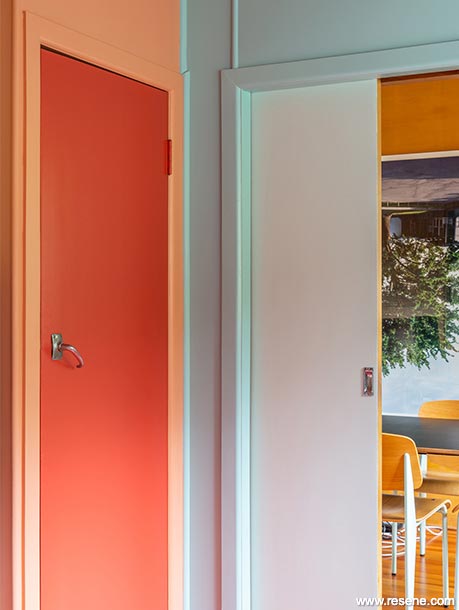 Orange, red, and blue kitchen