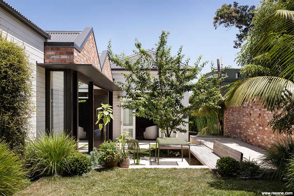 White and brick villa exterior
