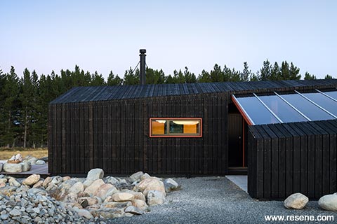 Skylark Cabin - cladding with dark wood stain