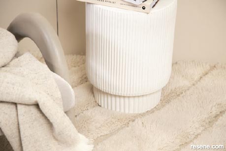 A gently fluted side table