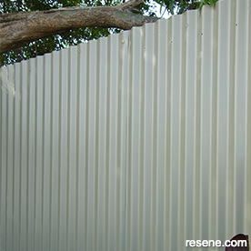 Paint an iron fence