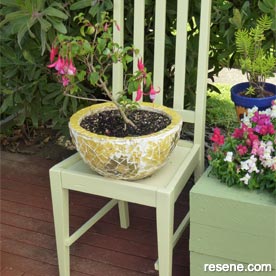 Plant stand from old chair