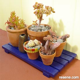 painted plant pot stand
