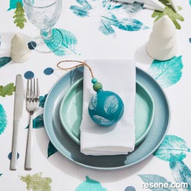 Festive foliage inspired tablecloth and christmas decoration